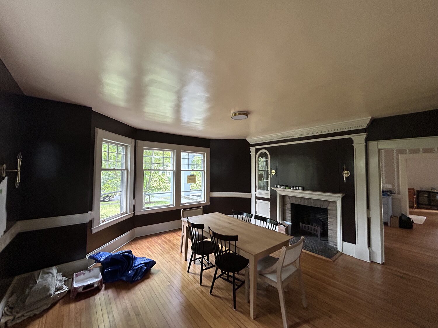 Dark charcoal dining room before painting