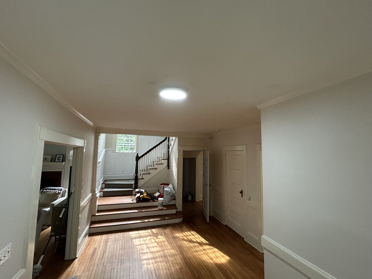 Finished bright white entry hall and staircase