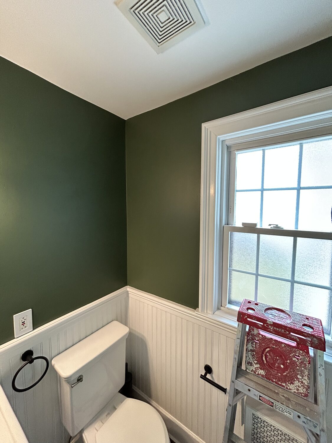 Bathroom in dark green before repaint